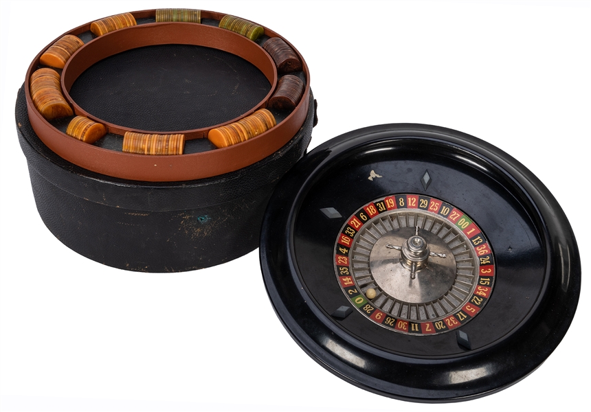 Small Traveling Roulette Gambling Outfit with Bakelite Chips.