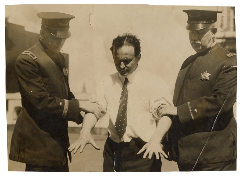  Houdini, Harry. Photograph of Houdini with Police Officers....