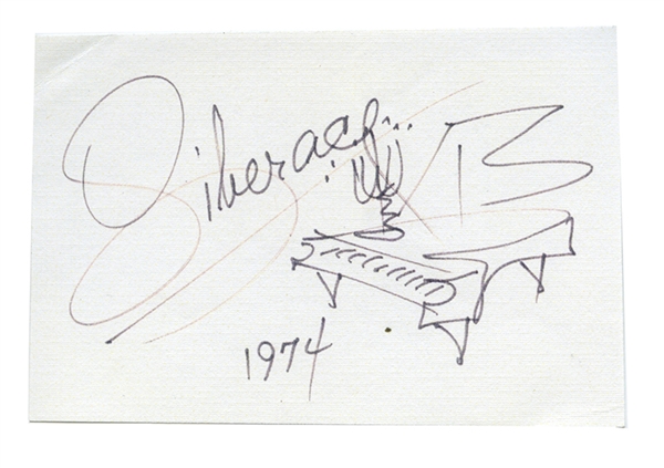 Liberace signature with drawing. 