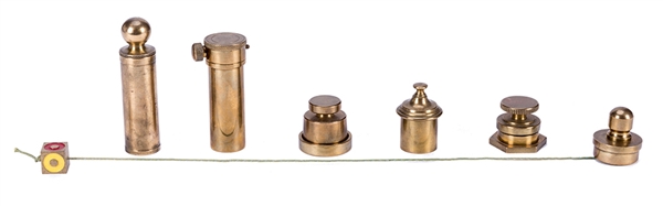 Collection of Seven Brema-Made Brass Pocket Tricks. 