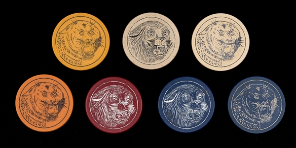 Seven Clay Poker Chips Engraved with Face of a Tiger. 