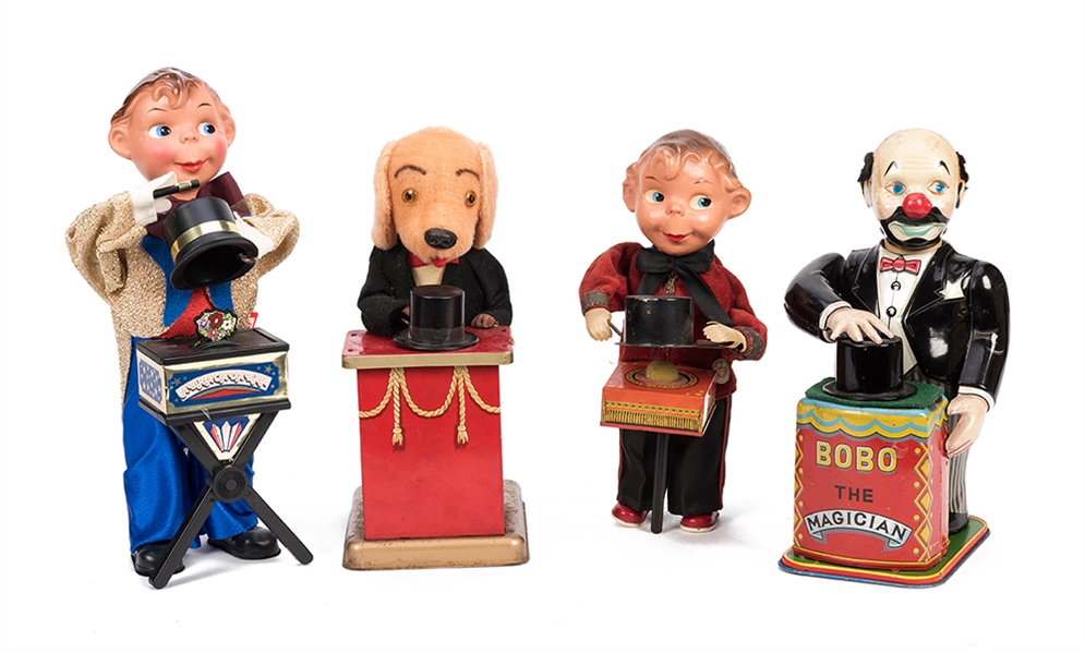 Lot of Four Magician Wind-Up Toys.