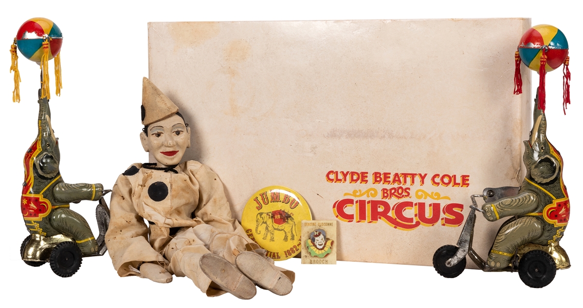 Collection of Vintage and Contemporary Circus-Themed Toys and Novelties.
