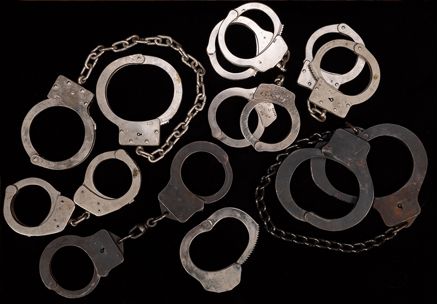 Group of Seven Vintage Handcuffs.