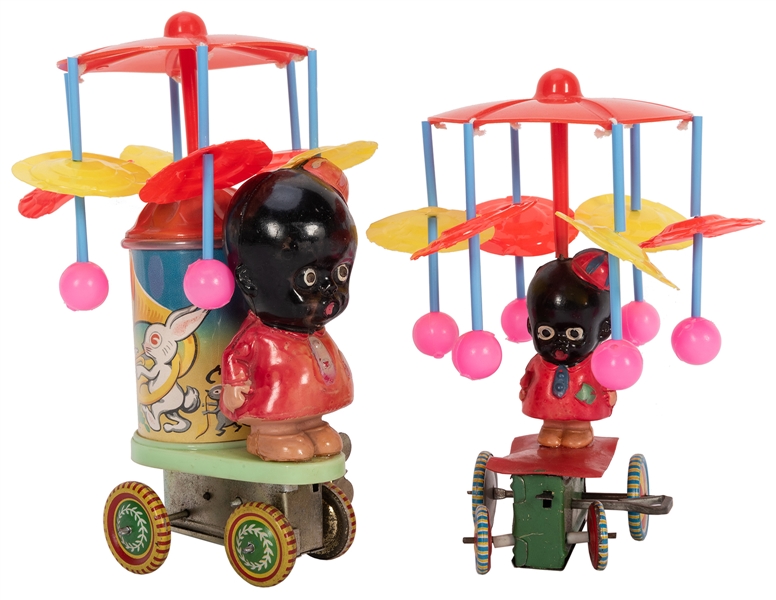 Pair of Celluloid Whirligig Carousel Tin Wind-Up Toys.