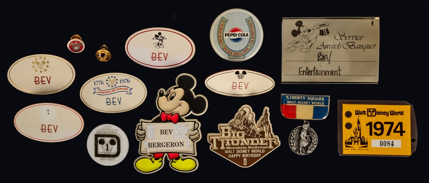 Collection of Walt Disney World Pins, Buttons, and Badges.