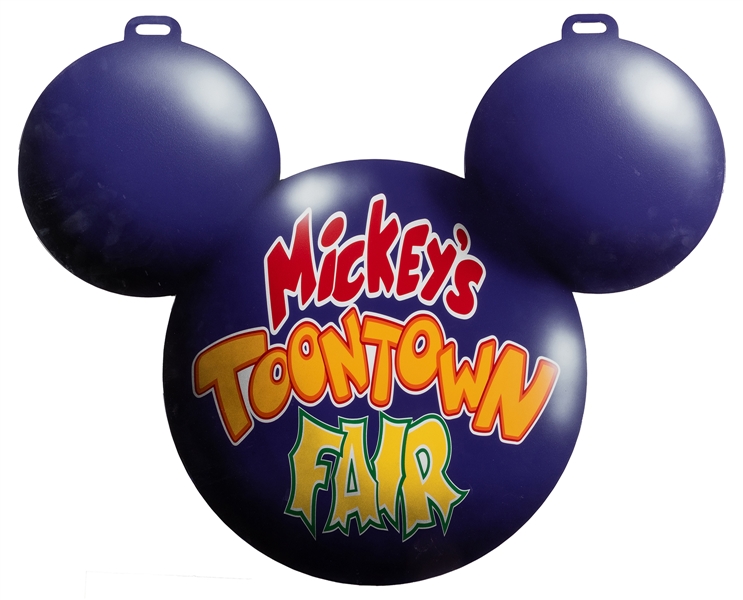 Mickey’s Toontown Fair directional metal park sign.