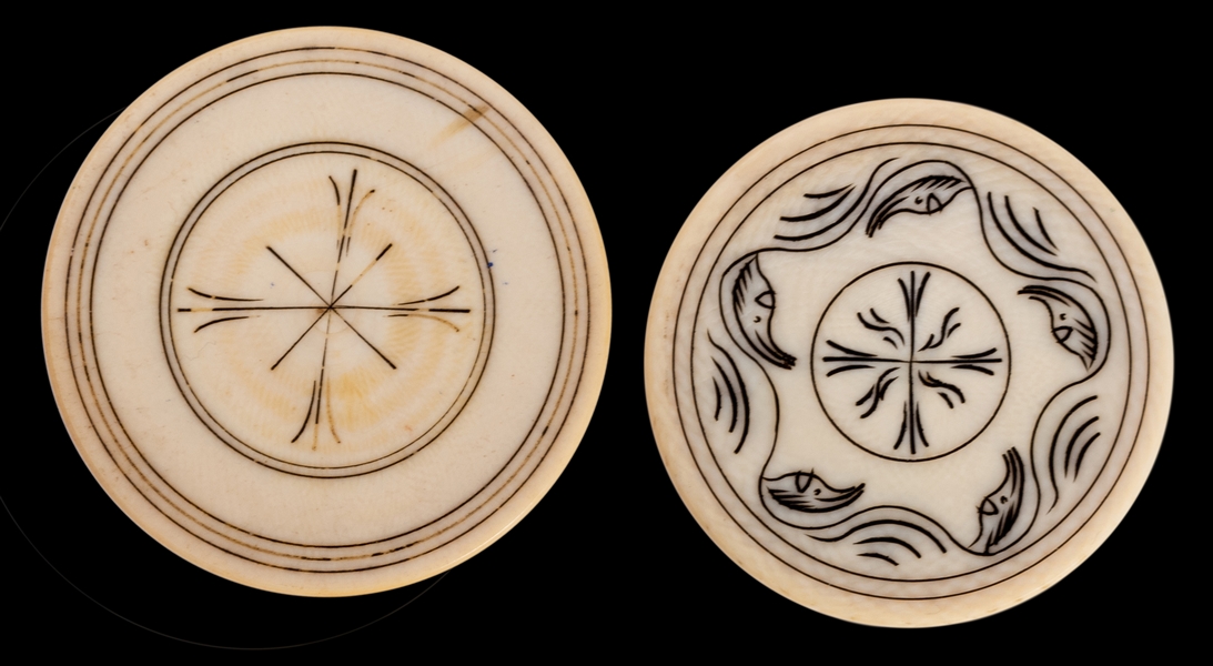  Two Ivory Poker Chips.