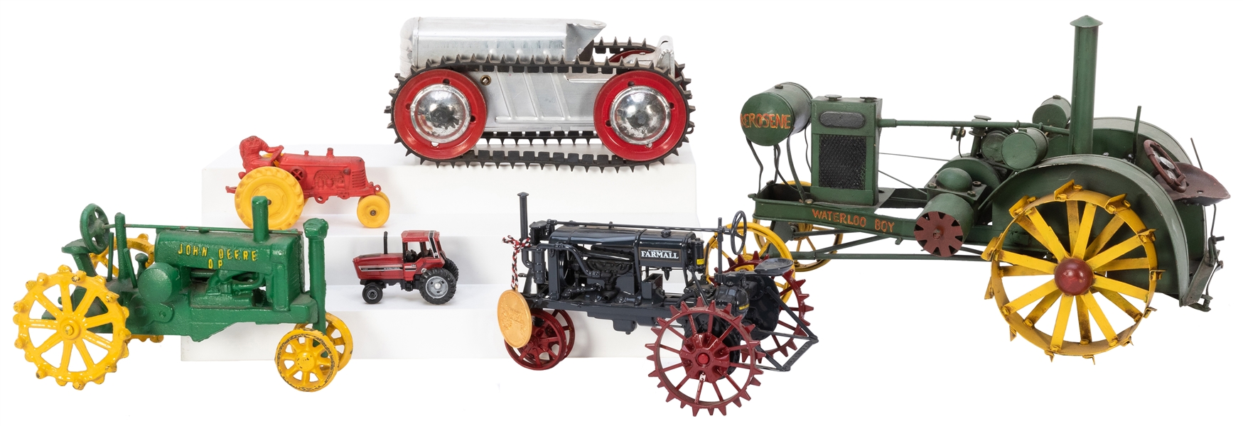  Group of Seven Toy Tractors. Most vintage. Consisting of a ...