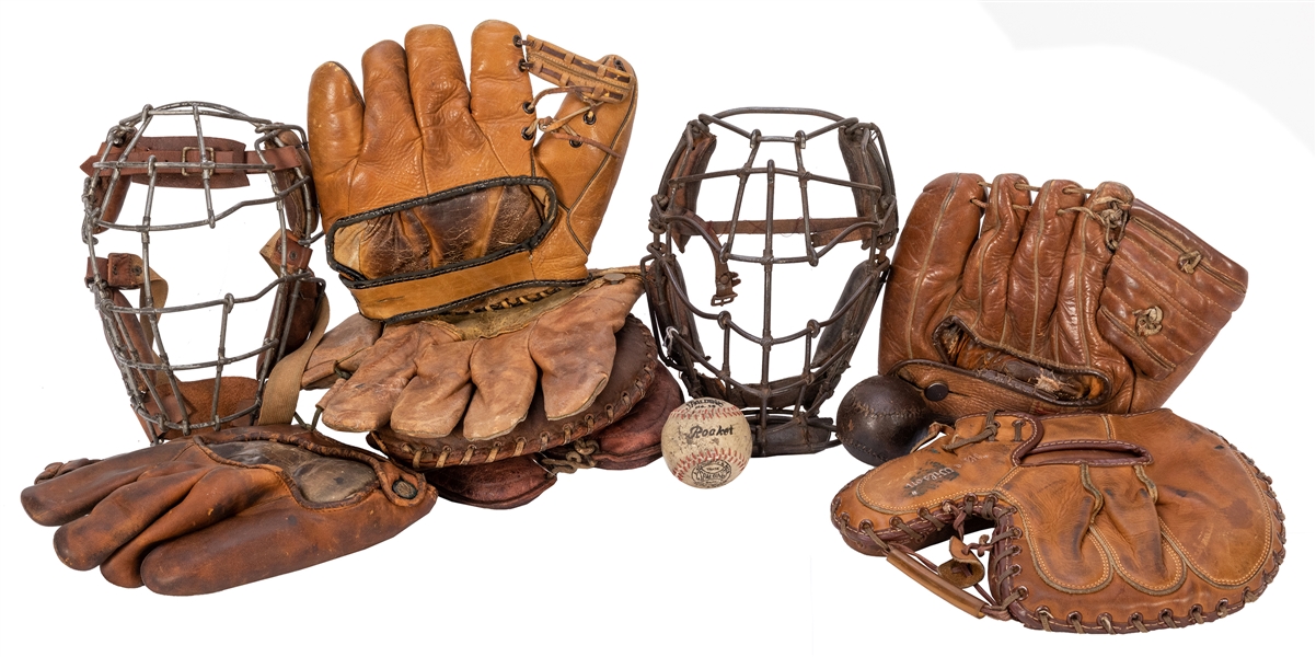  Group of 11 Early Baseball Gloves, Masks, and Balls. 1900s/...