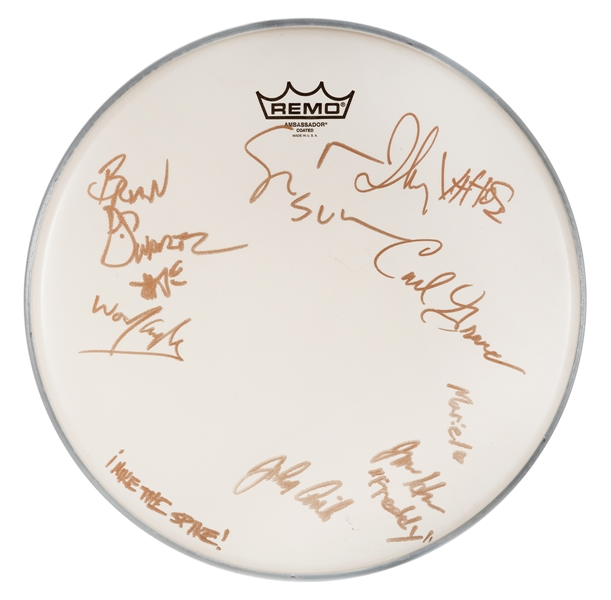  Oingo Boingo Band Member Signed Drumhead. Signed by 10 memb...