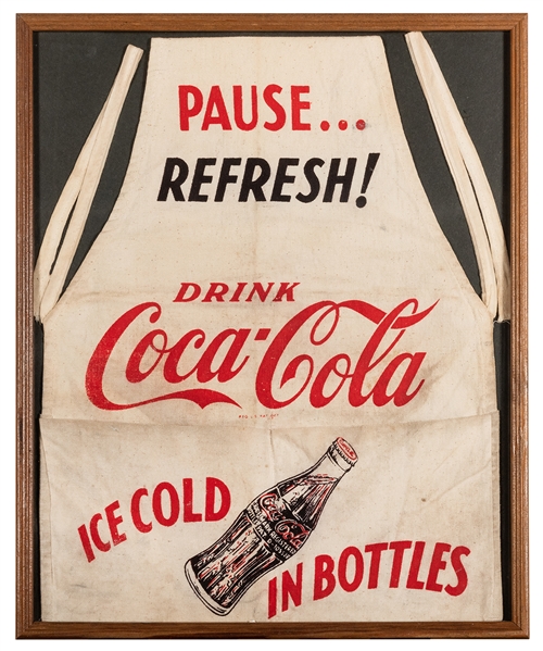  Framed Coca-Cola Apron. Circa 1960. Cloth apron bears the t...