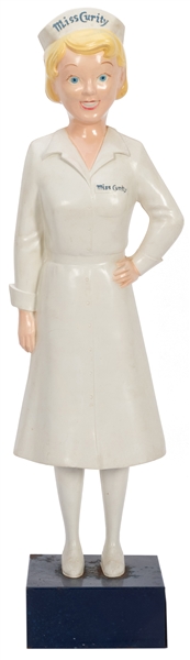  Miss Curity Counter Display Figure. Circa 1950s. Figural de...