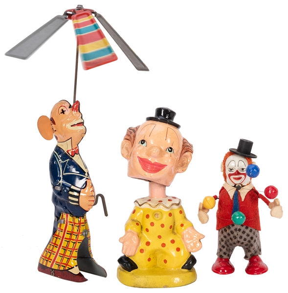  Trio of Clown Toys. Including a German tin litho clown with...