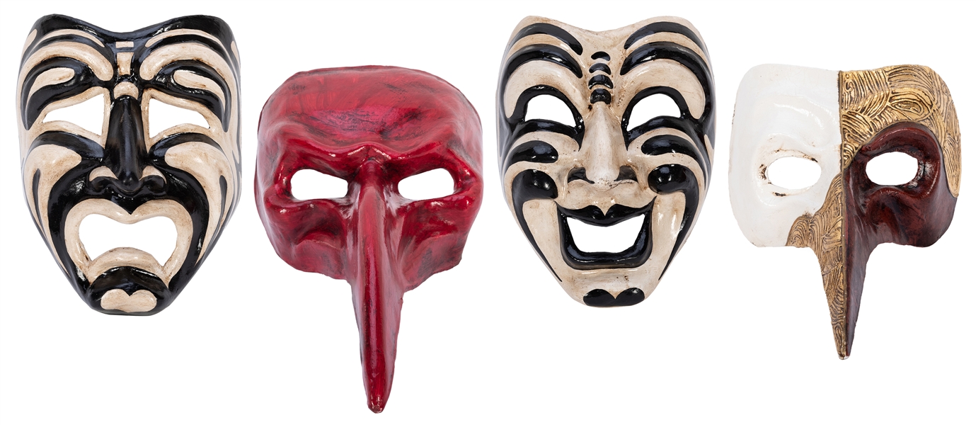 Four Papier Mache Venetian Masks. Hand painted. Each with c...