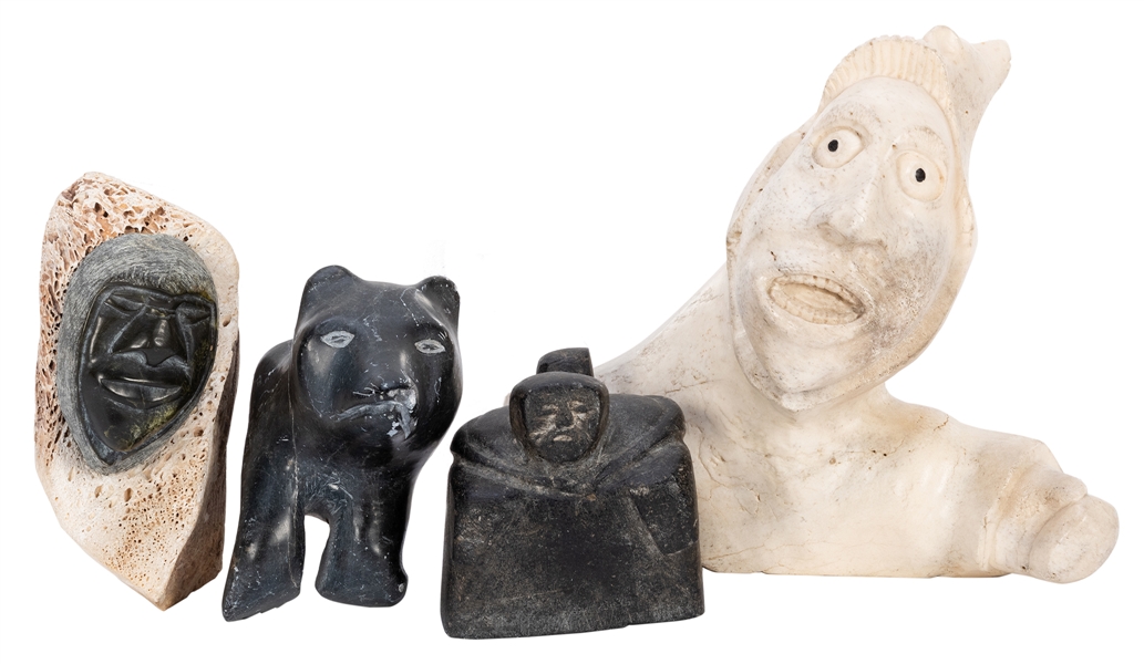  [Inuit] Four Inuit Soapstone Carvings. Includes a woman wit...