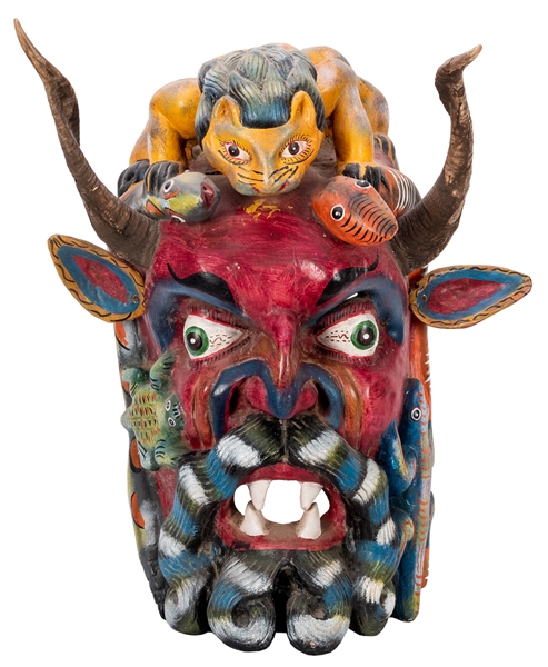  Massive Carved and Painted Horned Mask. 20th century. Carve...