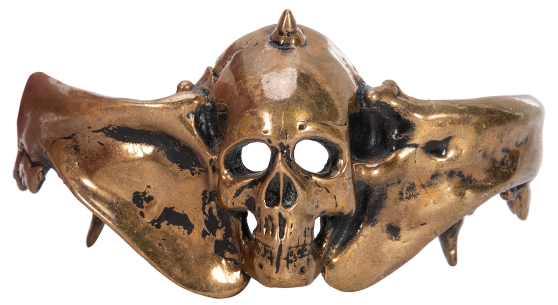  Axel Stocks Brass Skull Bangle. Brass bangle depicting a hu...