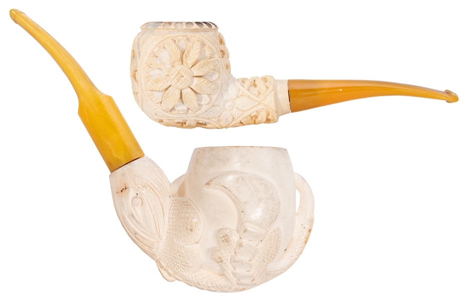  Pair of Carved Meerschaum Pipes. The first deeply carved wi...