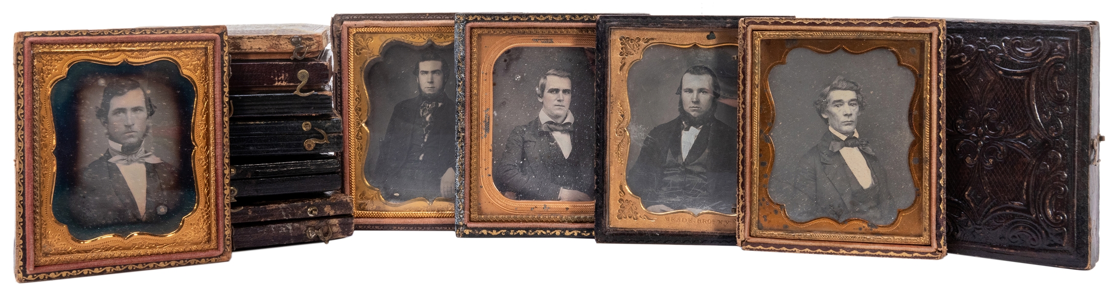  Twelve Daguerreotype Portraits of Male Subjects. Circa 1840...