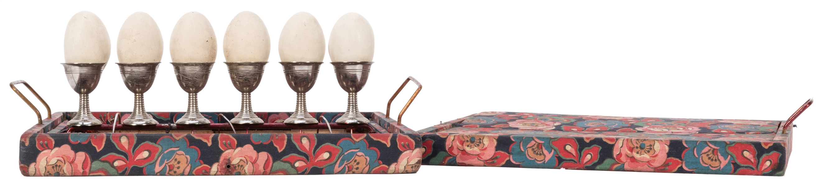  Flying Egg Cups. Hamburg: Janos Bartl, 1920s. A tray holds ...