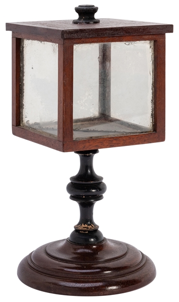  Mirror Casket. Circa 1920. Wooden box atop a short turned w...