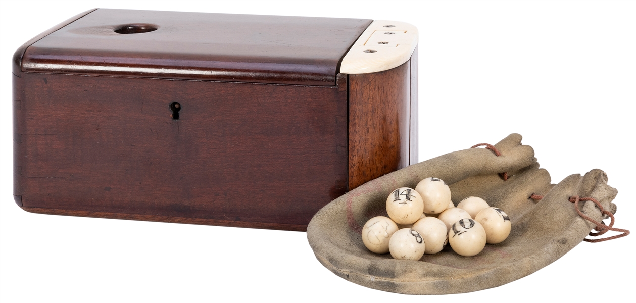  Scrimshawed Ivory Keno Balls in Box. 19th century. Sixty-fo...