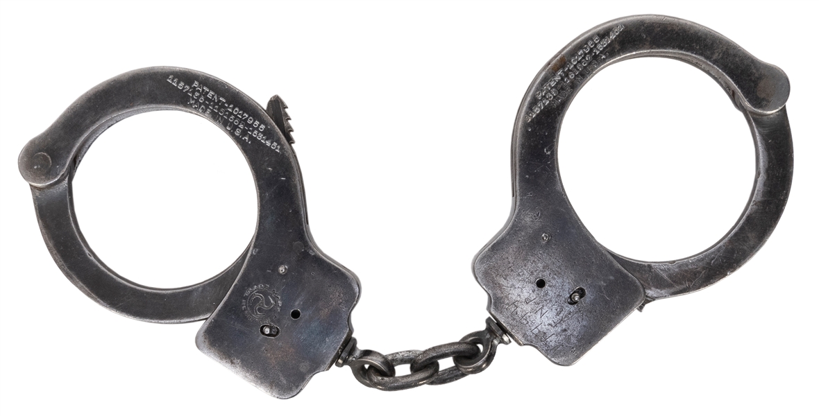 Houdini, Harry (Ehrich Weisz). Houdini-Wresch Collection Gimmicked Peerless 1915 Handcuffs. 