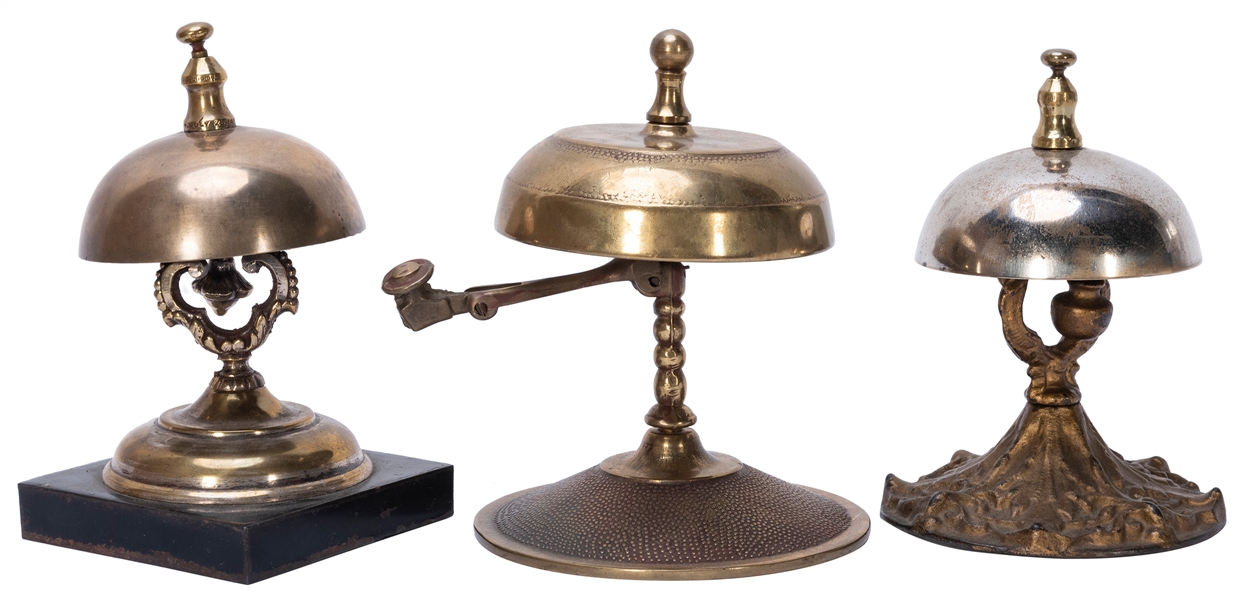  Four Antique Brass Hotel Bells. Approximate height of each,...