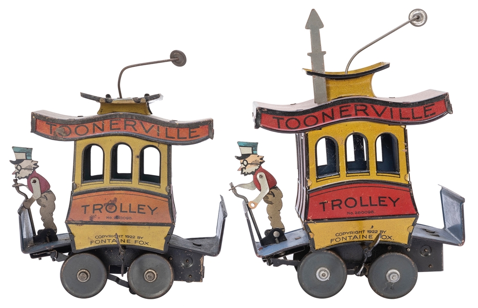  Pair of Fountain Fox Toonerville Trolley Windup Toys. 1922....
