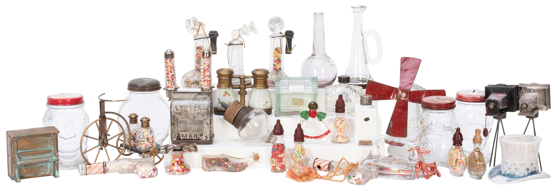  Collection of Over 60 Glass Candy Containers. Consisting of...