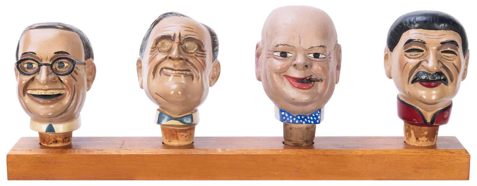  [WWII] Four Political Caricature Bottle Stoppers. Depicting...