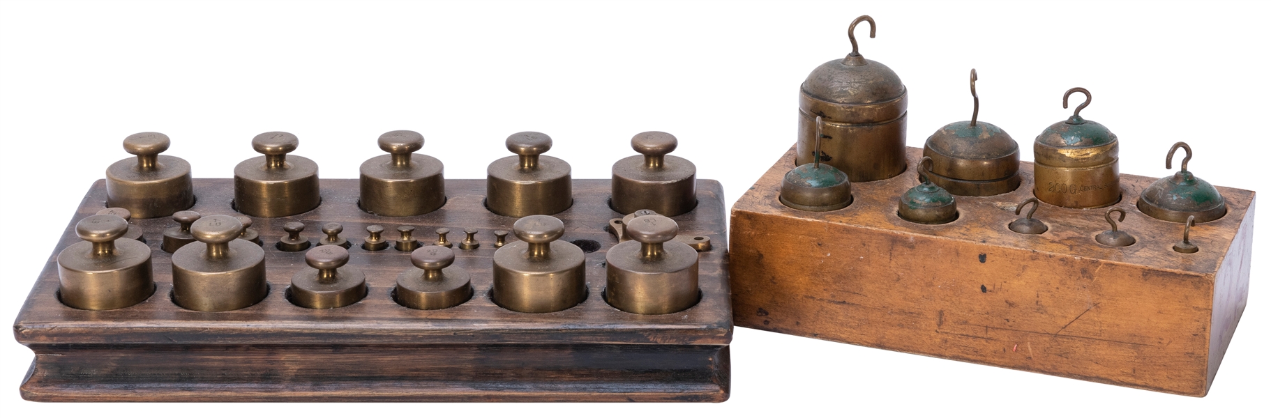  Two Early Brass Weight Sets. Both sets in fitted wood cases...