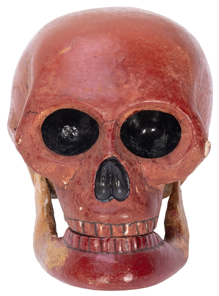  Talking Skull. European, 1930s. A red tinted papier-mache s...