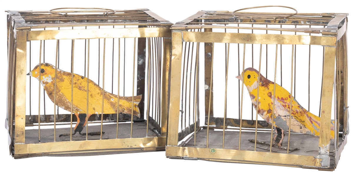  Production Cages. Circa 1910. A pair of two brass cages tha...