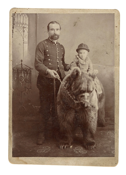  Photograph of a Bear Trainer and his Bear. Circa 1900. Cost...