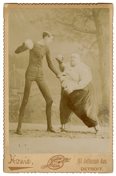  Sideshow Boxing Match Photograph. Detroit: Howie, ca. 1900....