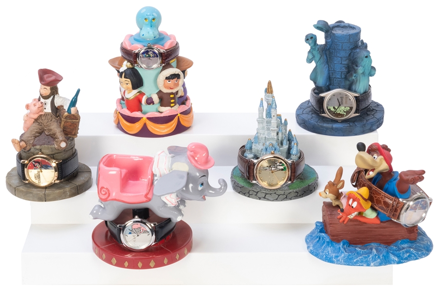  Six Disney Ride Figurines and Matching Watches. Walt Disney...