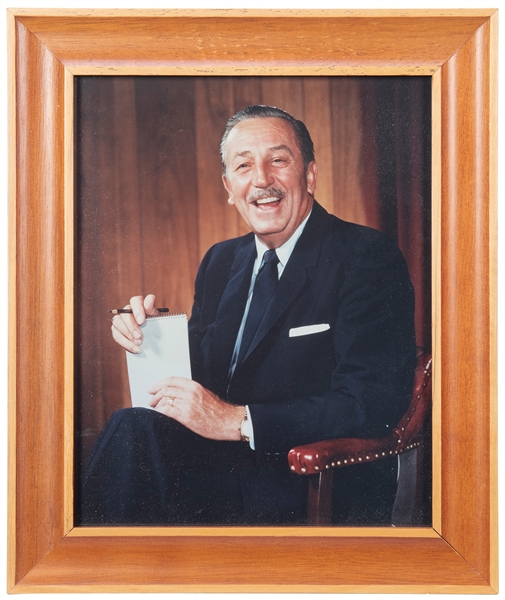  Framed Walt Disney Photograph. Walt smiles into the camera,...
