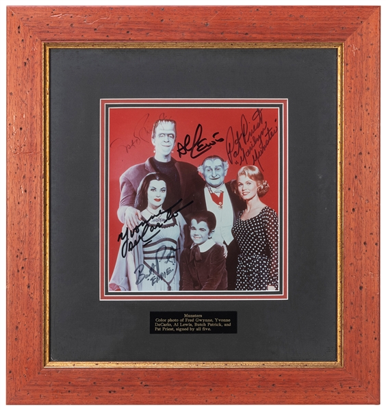  The Munsters Signed Display. Color photograph signed by sta...