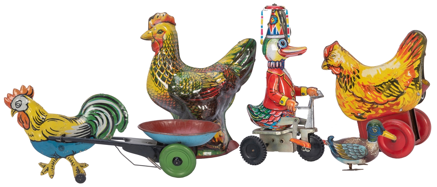  Lot of Five Tin Lithograph Toys. Including: Duck on bicycle...