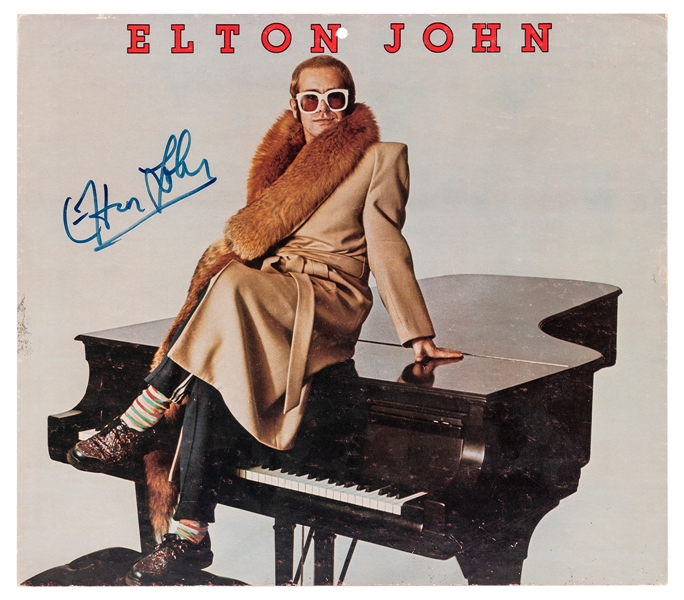  Elton John Signed Photo Card. Calendar cover signed by Elto...