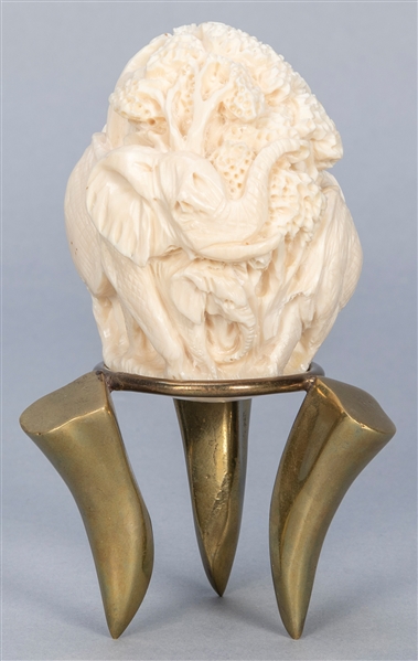  [SCRIMSHAW] Carved Elephant. Egg-shaped figure depicting a ...