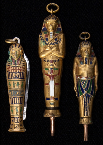  Trio of Egyptian Revival Items. Circa 1920s. Includes pocke...