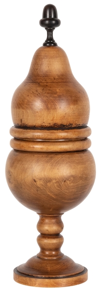  Ball Vase. Circa 1900. Tall turned wooden vase from which a...
