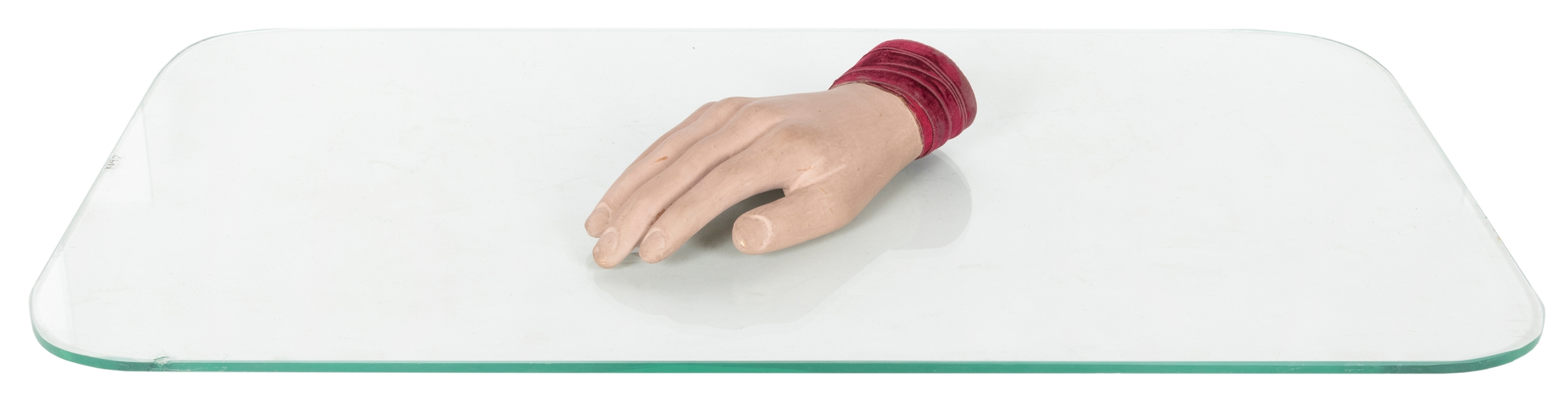  Rapping Hand. Circa 1920. A disembodied wooden hand with ve...