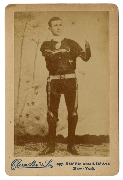  Cabinet photo of a multiple amputee with hook hand tools. N...