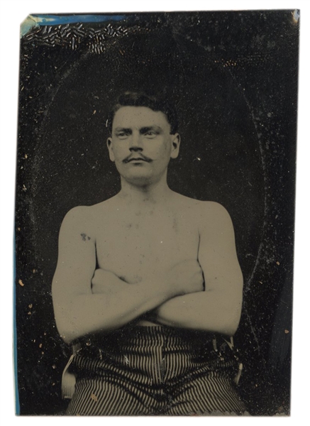  [EARLY PHOTOGRAPHY]. Tintype of a shirtless young man / per...