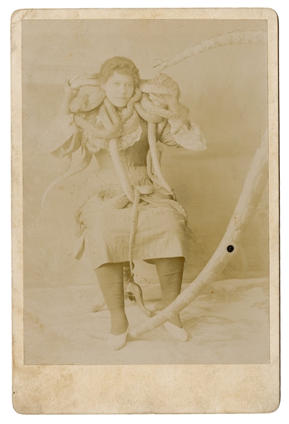  [SNAKE CHARMER]. Cabinet photo of an African American snake...