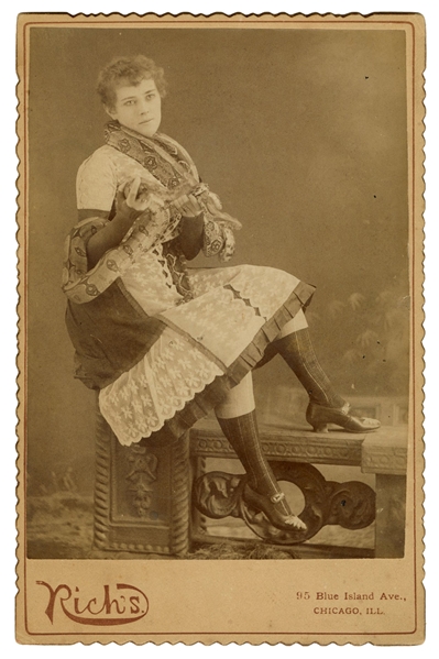  Cabinet photo of a snake charmer. Chicago: Rich’s, ca. 1900...